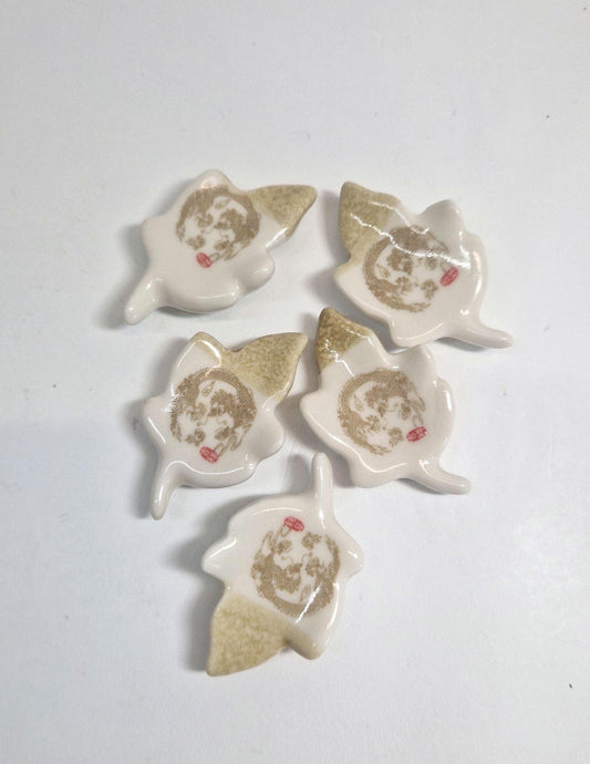 5 Chopstick Holders, Leaf Shaped with Dragon Design in Cream and Beige.