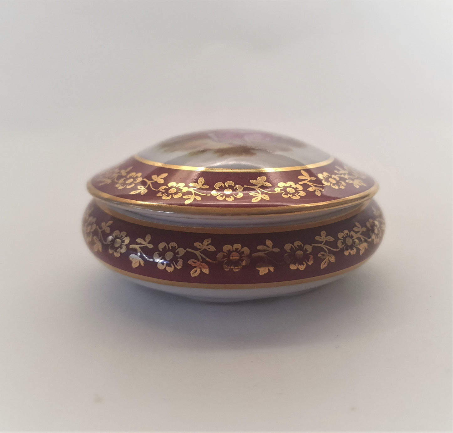 Red Limoges Porcelain Trinket Box with Fragonard's picture of Lovers. c1960's