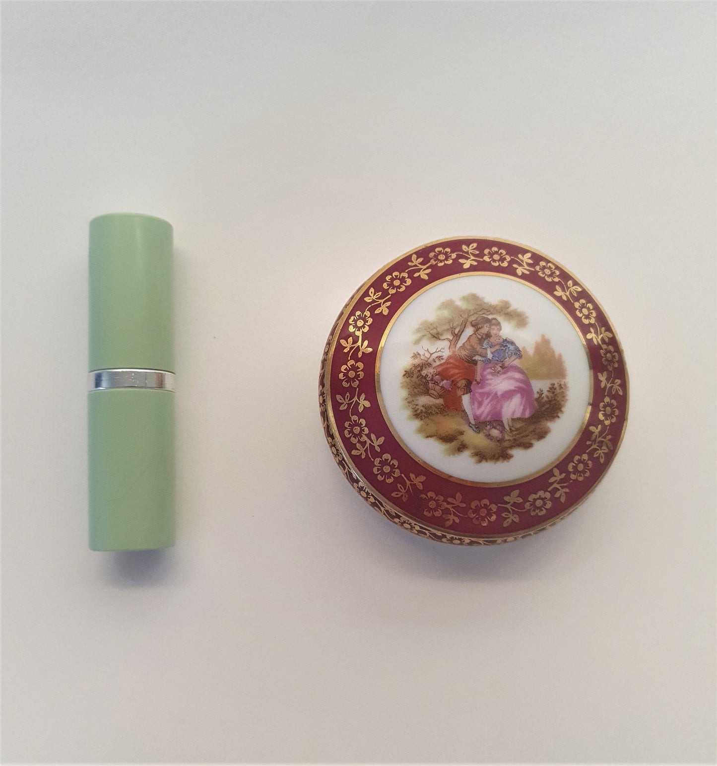 Red Limoges Porcelain Trinket Box with Fragonard's picture of Lovers. c1960's