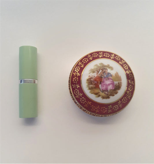 Red Limoges Porcelain Trinket Box with Fragonard's picture of Lovers. c1960's