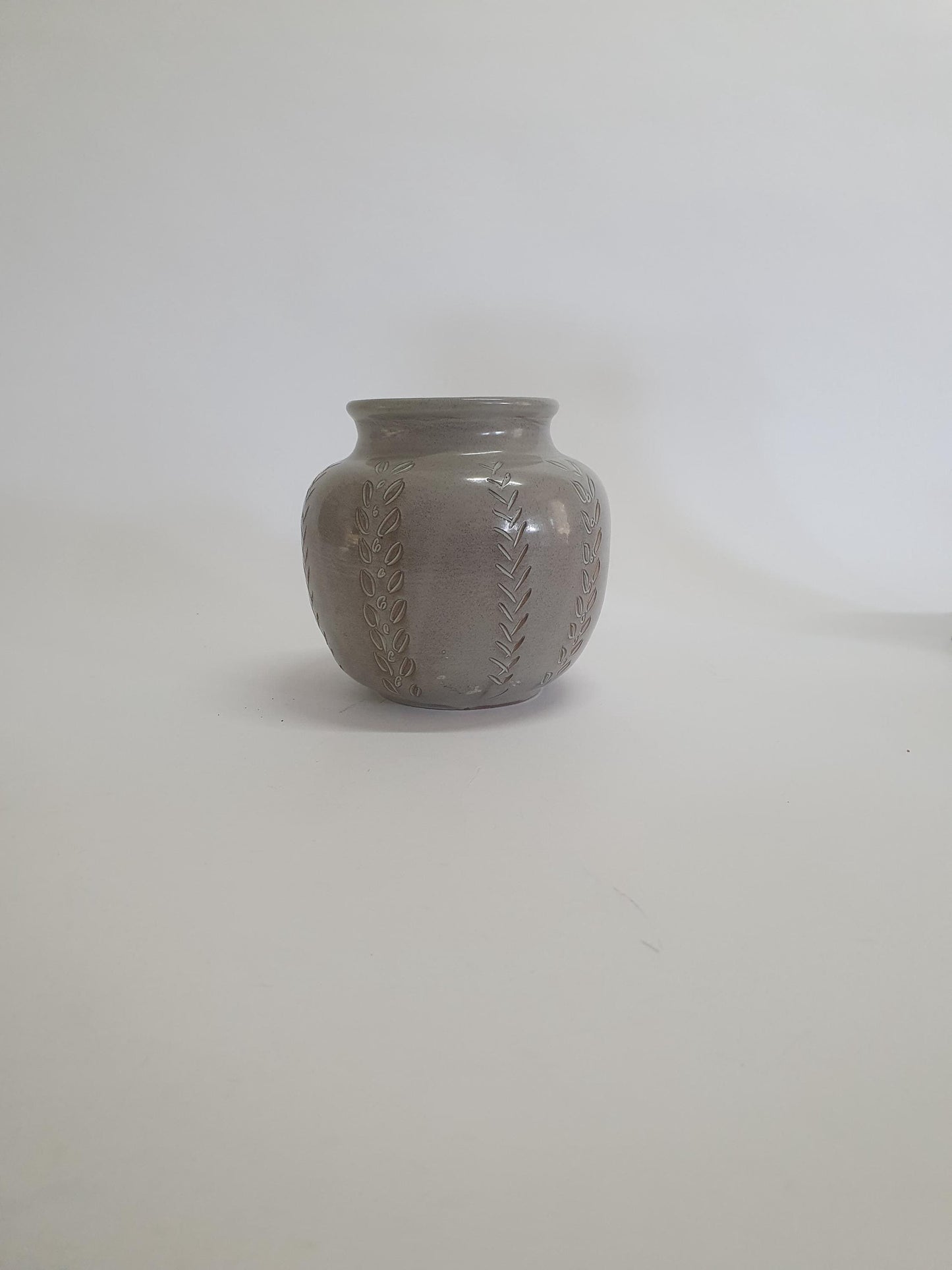 Vintage Round Vase with Leaves and Criss-cross Cut-outs, speckled beige glaze. c1970s