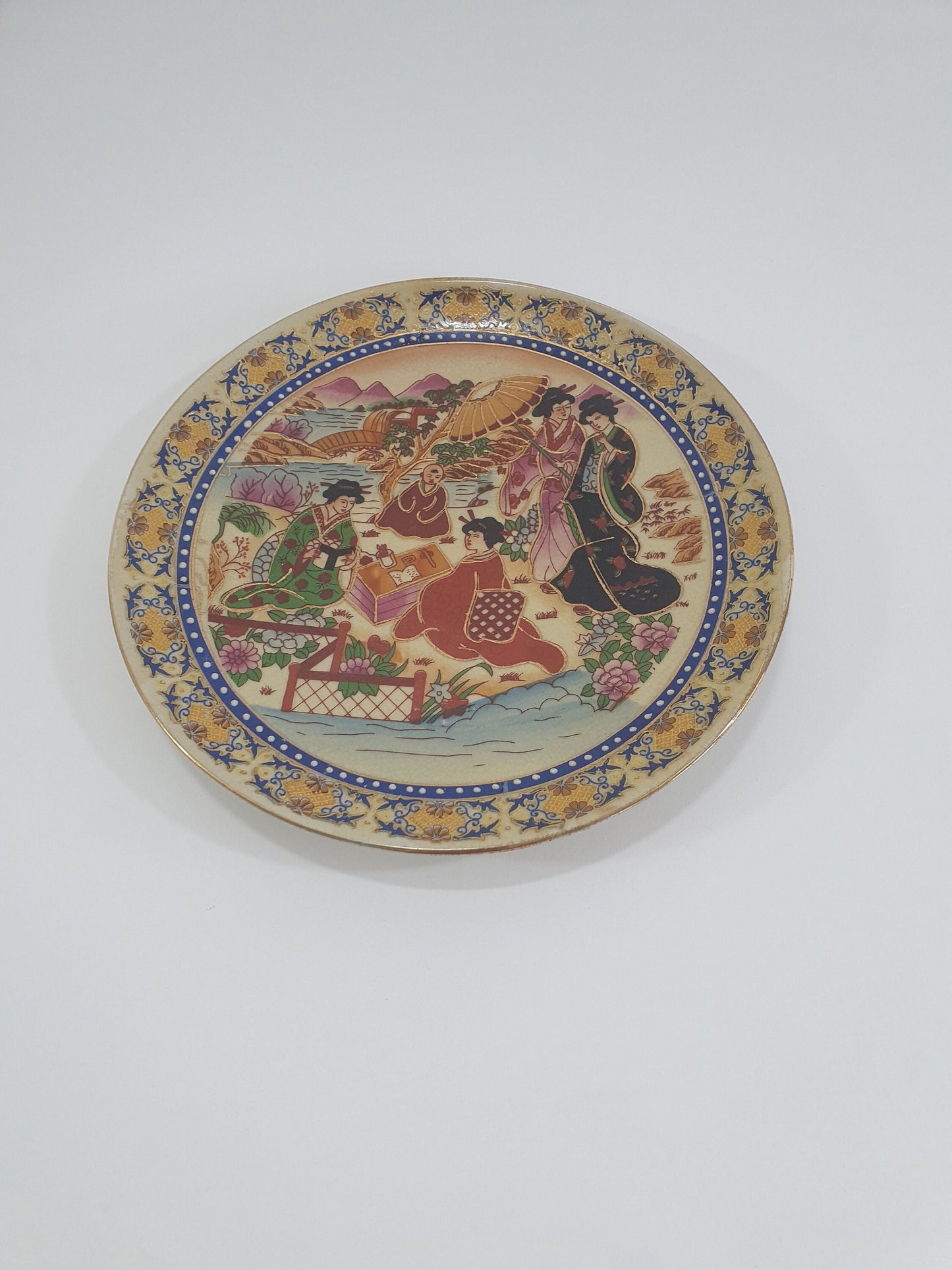 Vintage Japanese Satsuma Display Plate finished in Embossed Gold.  Earthenware pottery, Hand-painted.