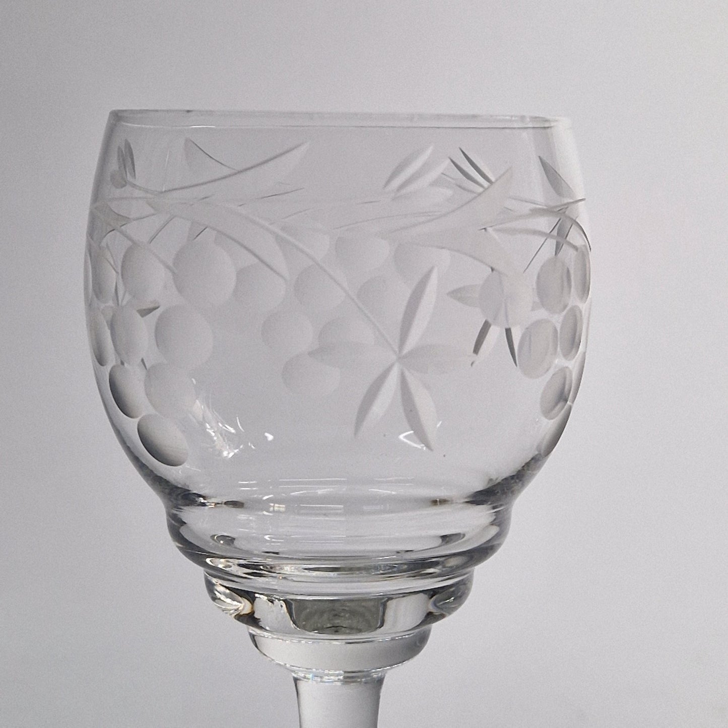 Pair of Vintage Grapes and Leaves etched Wine Glasses.  Late 20th Century.