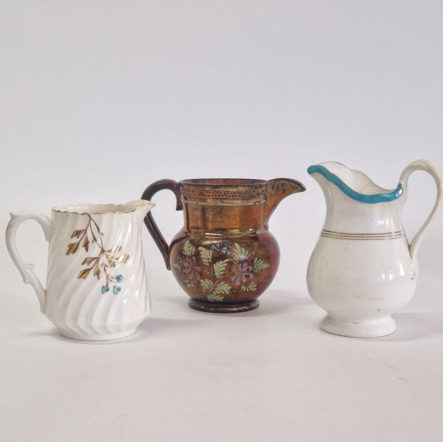 Motley Crew of 9 Creamers and Jugs. c1900s - 1950s