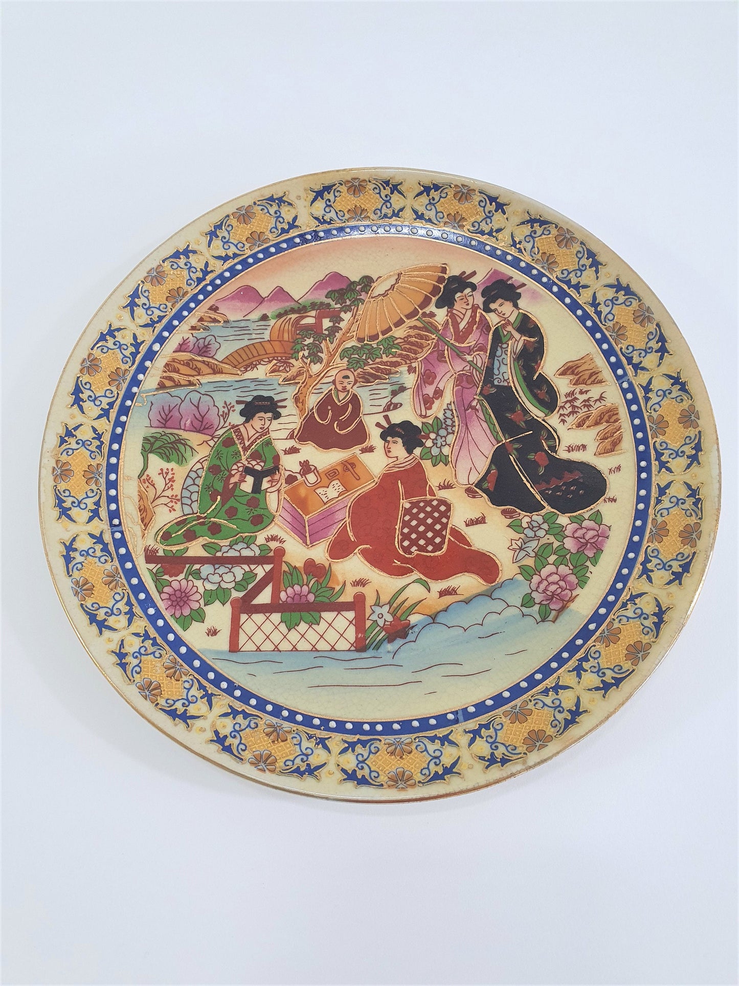 Vintage Japanese Satsuma Display Plate finished in Embossed Gold.  Earthenware pottery, Hand-painted.