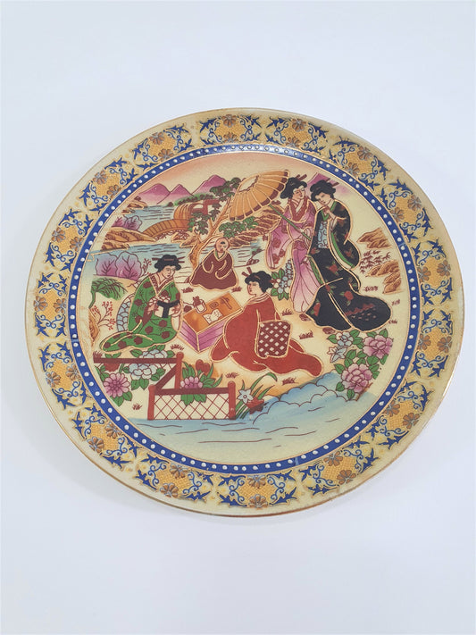 Vintage Japanese Satsuma Display Plate finished in Embossed Gold.  Earthenware pottery, Hand-painted.