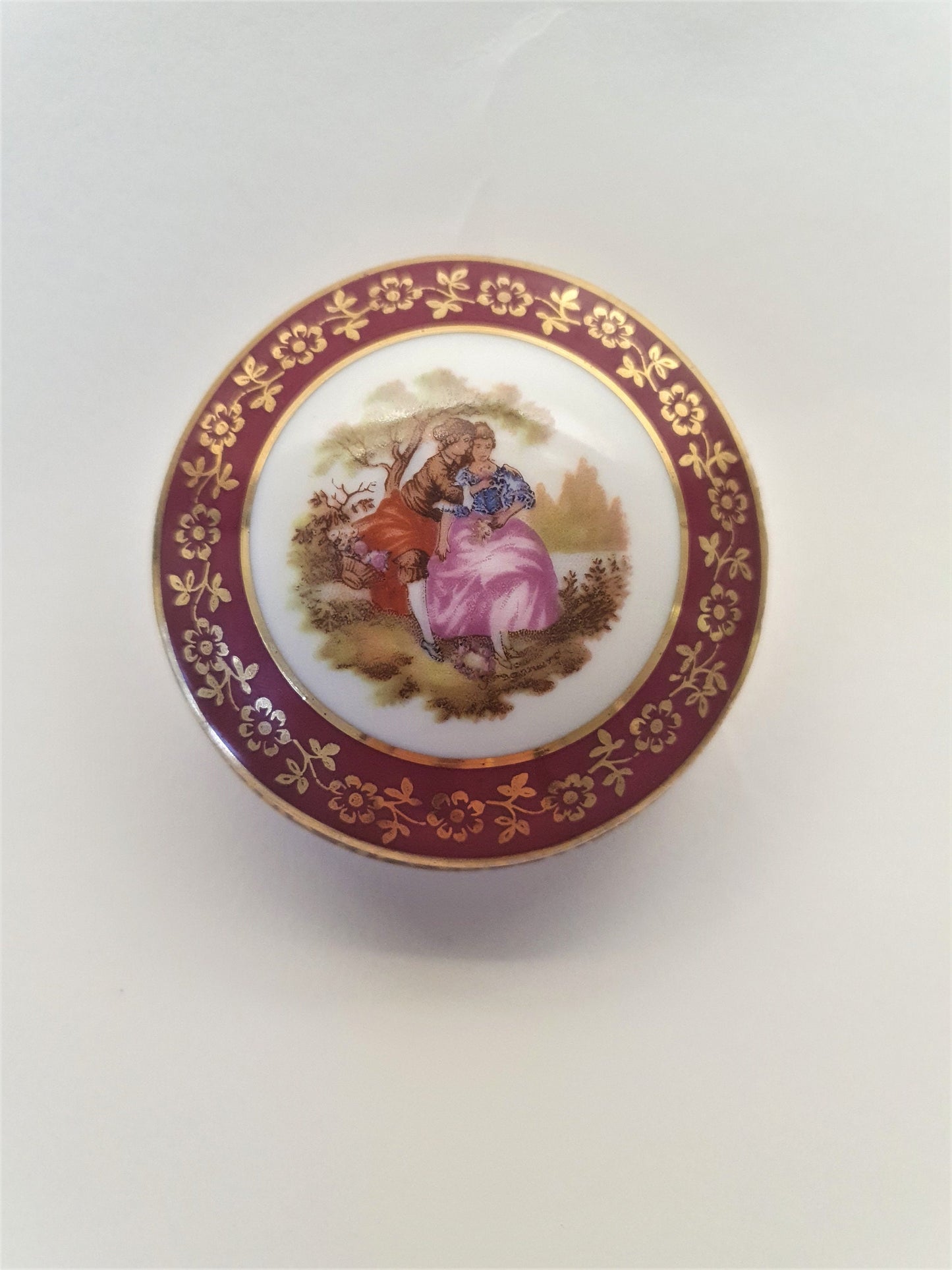 Red Limoges Porcelain Trinket Box with Fragonard's picture of Lovers. c1960's
