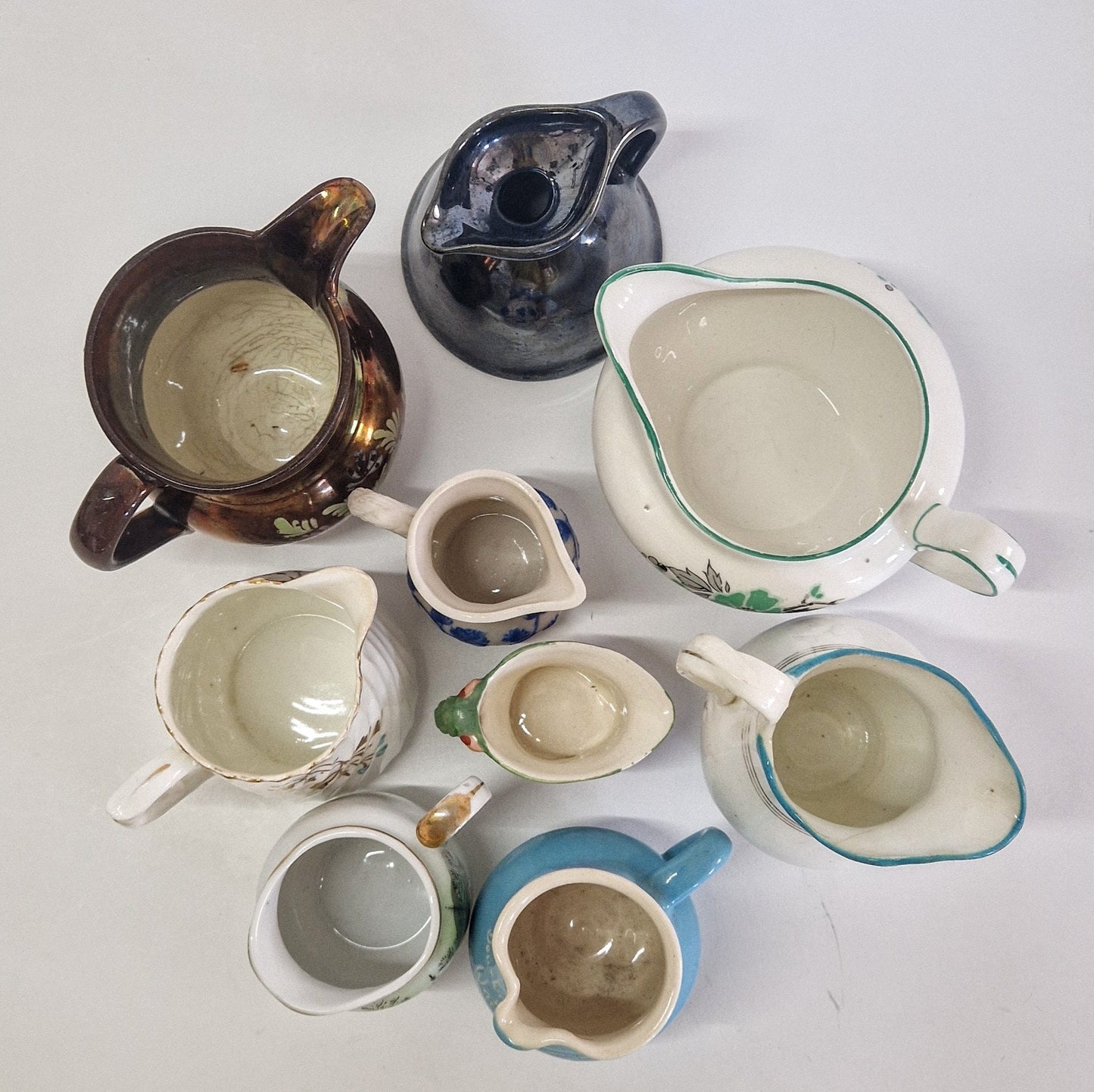 Motley Crew of 9 Creamers and Jugs. c1900s - 1950s
