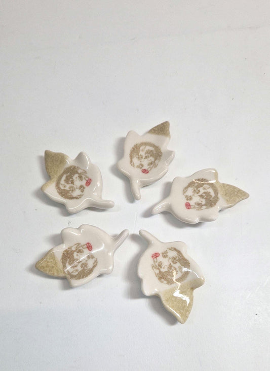 5 Chopstick Holders, Leaf Shaped with Dragon Design in Cream and Beige.