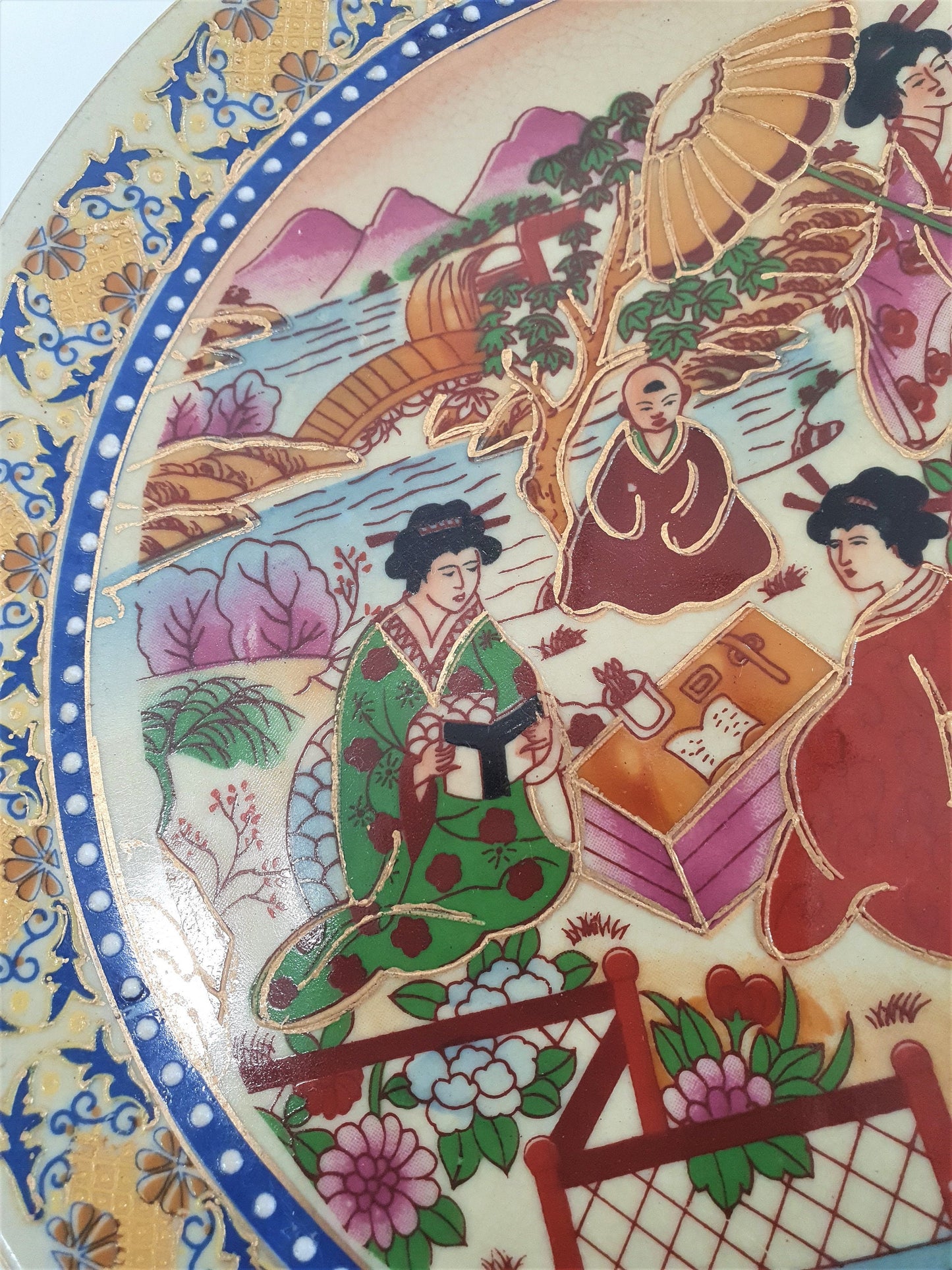 Vintage Japanese Satsuma Display Plate finished in Embossed Gold.  Earthenware pottery, Hand-painted.
