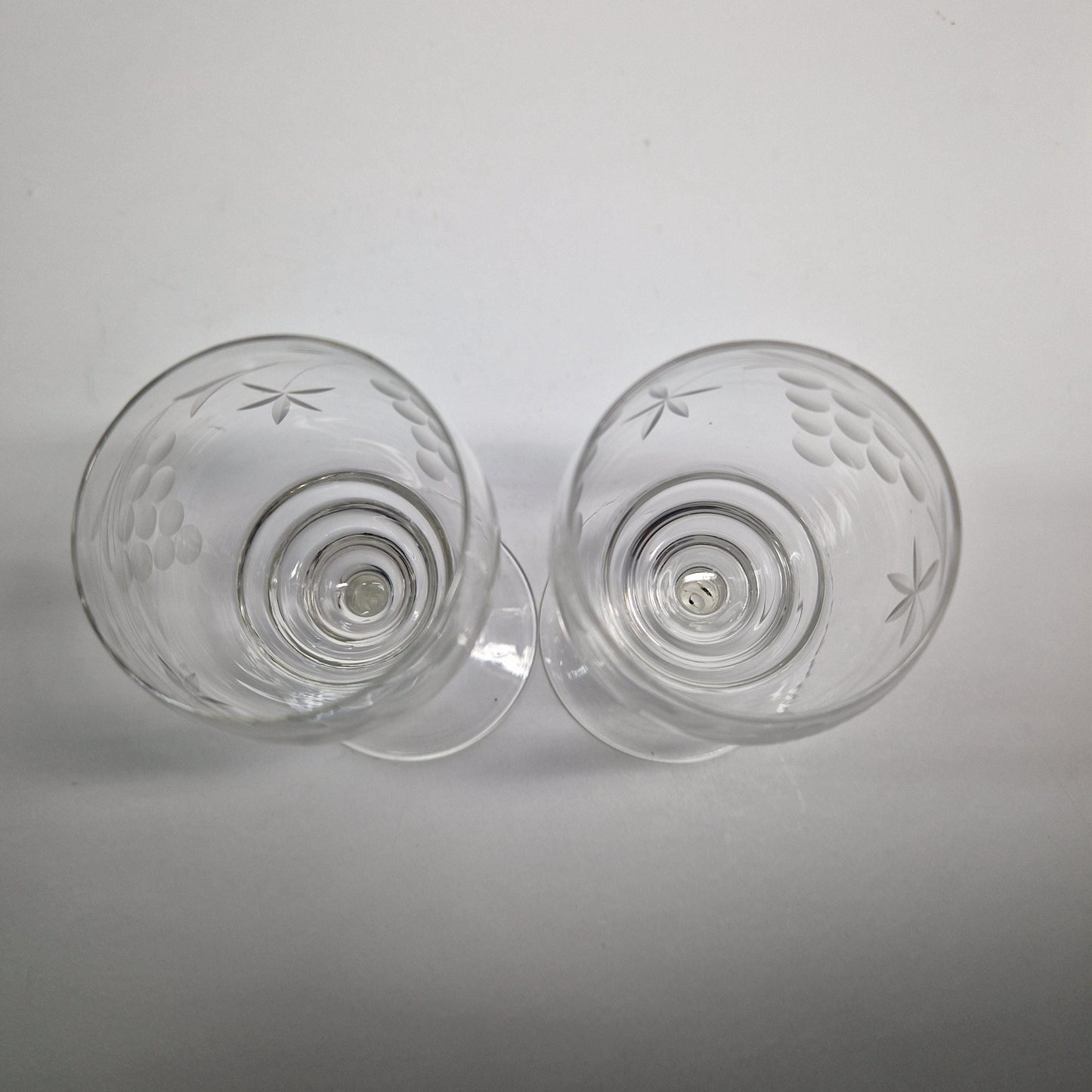 Pair of Vintage Grapes and Leaves etched Wine Glasses.  Late 20th Century.